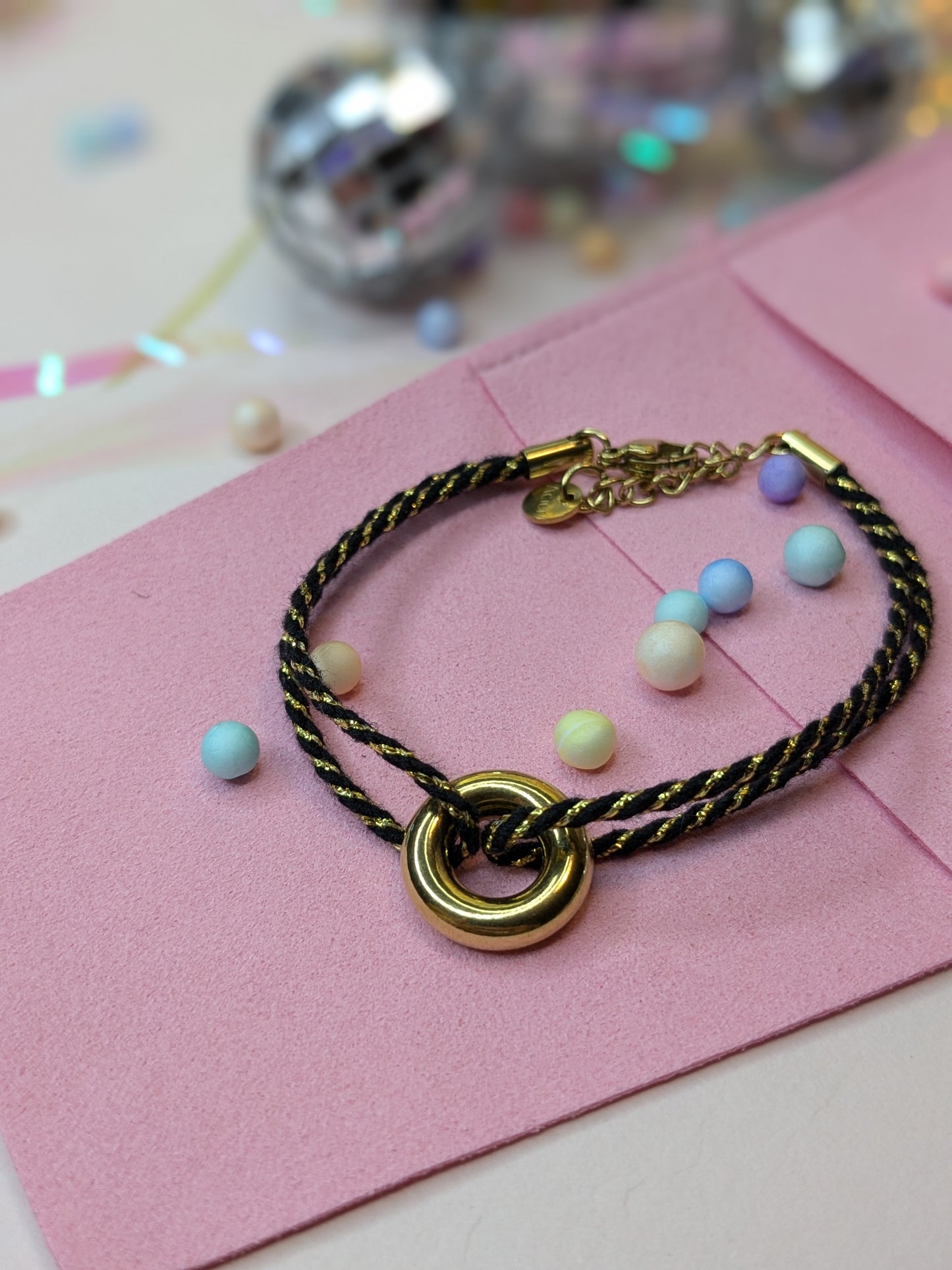 Bracelet corde et donuts en acier