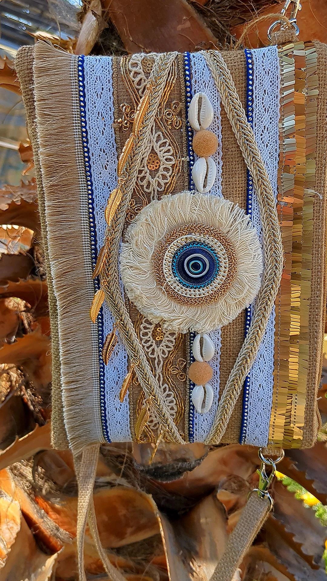 Pochette œil Nazar rond 🧿