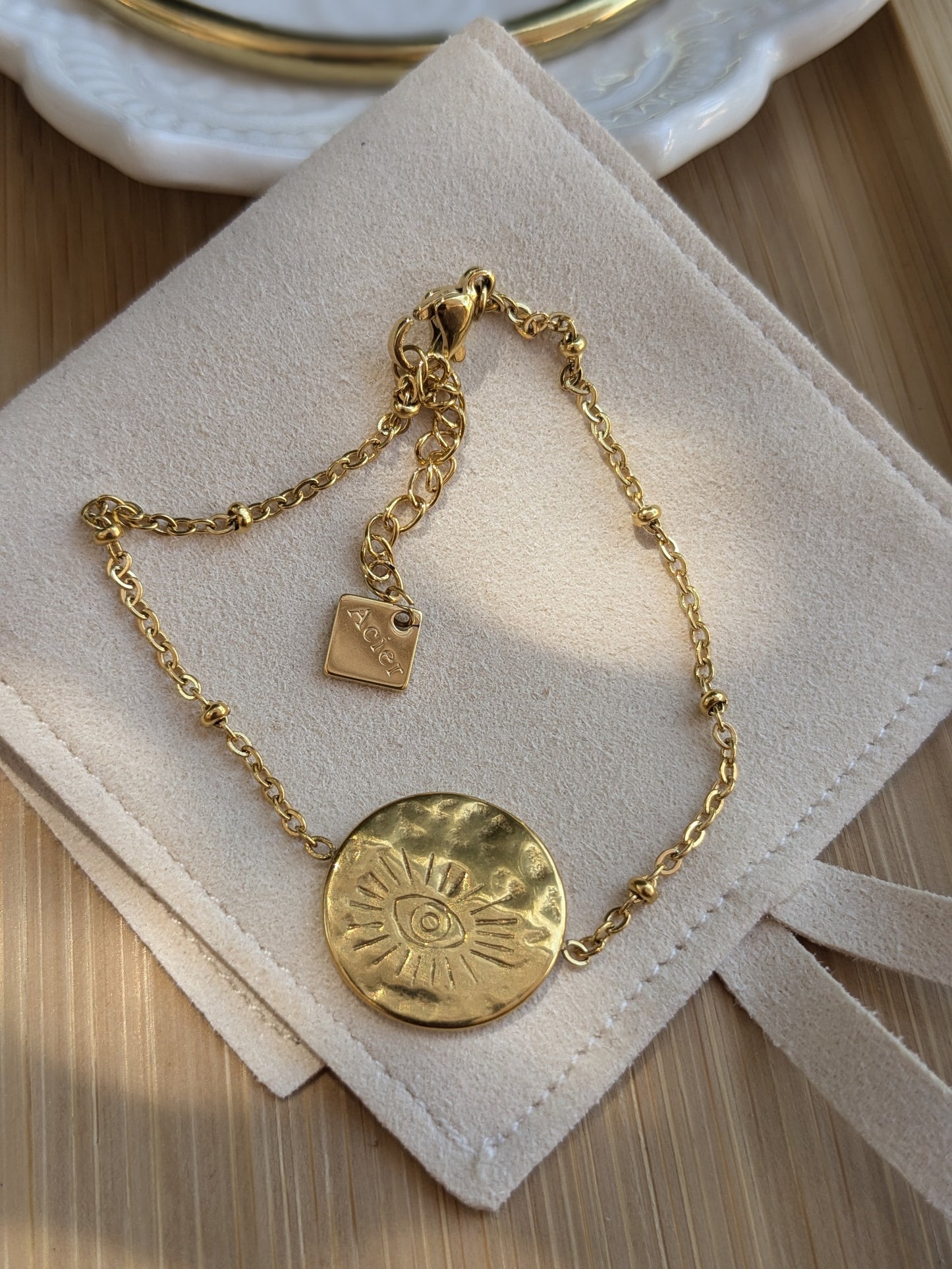 Bracelet médaille oeil de protection