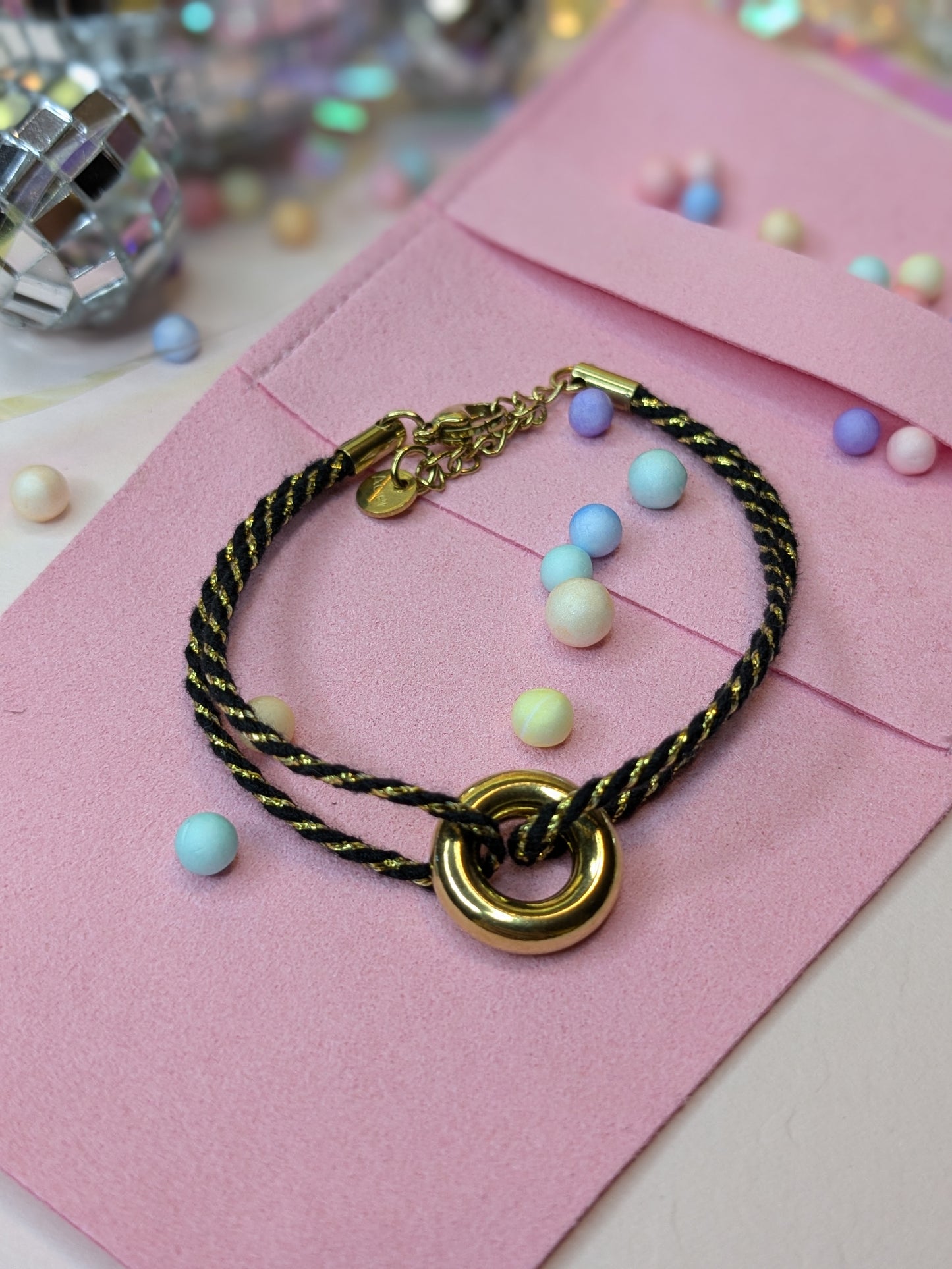 Bracelet corde et donuts en acier